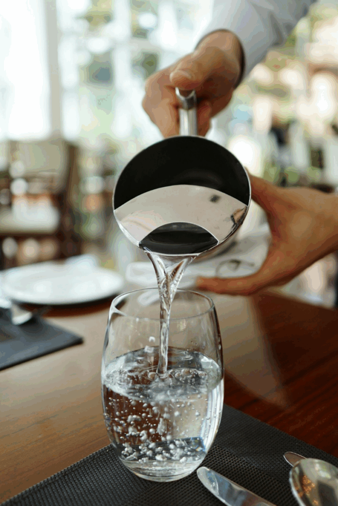 A glass of water representing the 2 cup manifestation method.