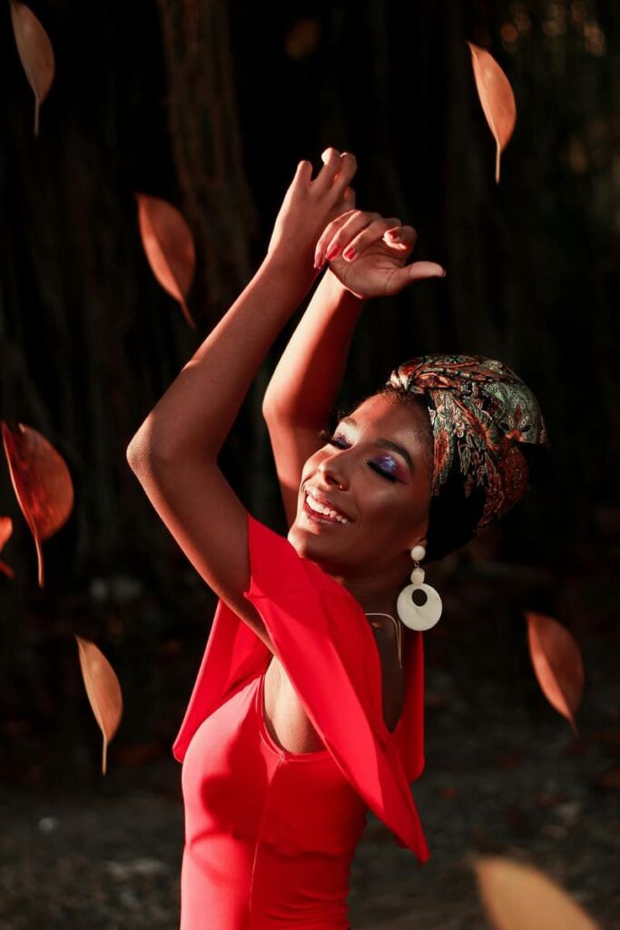 Image of a woman who is happy with her choice to overcome limiting beliefs.