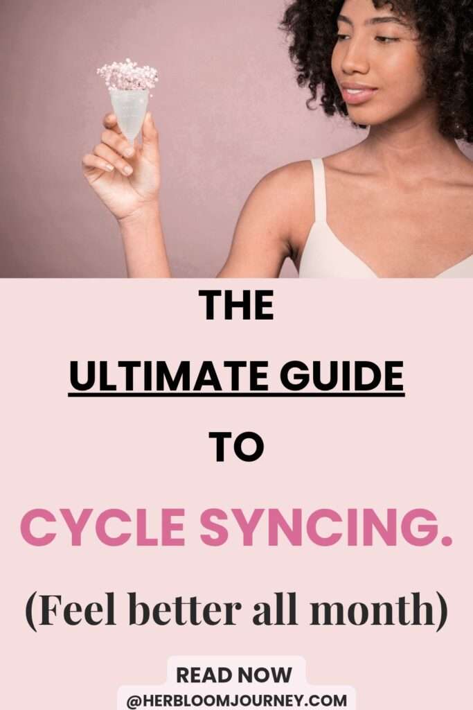 Pink Pinterest pin with the image of a woman holding a menstrual cup and an overlay text reading "the ultimate guide to cycle syncing feel better all month."