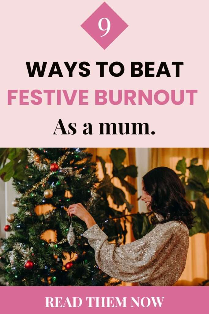 Pink Pinterest pin with image of a woman hanging decorations on a Christmas tree and an overlay text reading "9 ways to beat festive burnout as a mum."